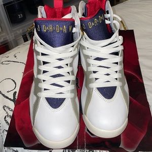 2004 Retro Air Jordan Olympic Size 8.5. Still wearable. Only crack on the heels.